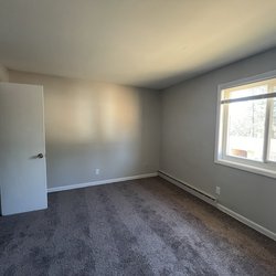 Updated Bedroom with Dark Carpet at The Preserve on Conley located in Forest Park, GA
