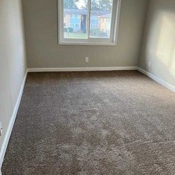Updated Bedroom with Dark Carpet at The Preserve on Conley  located in Forest Park, GA